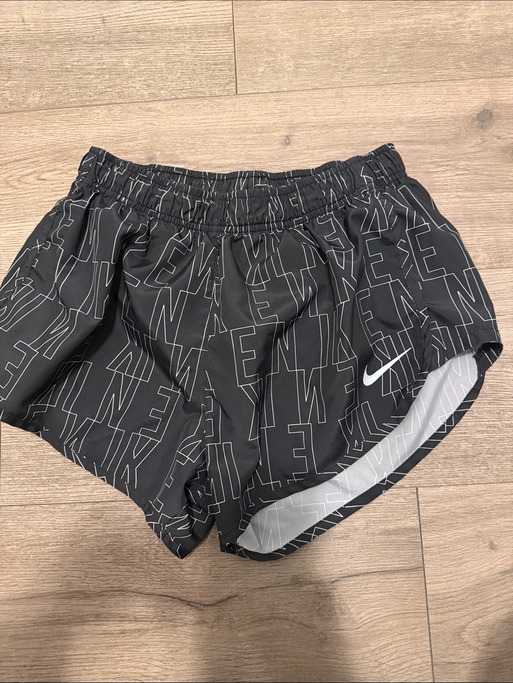 Nike Black Shorts with White Swoosh and Graphic Print